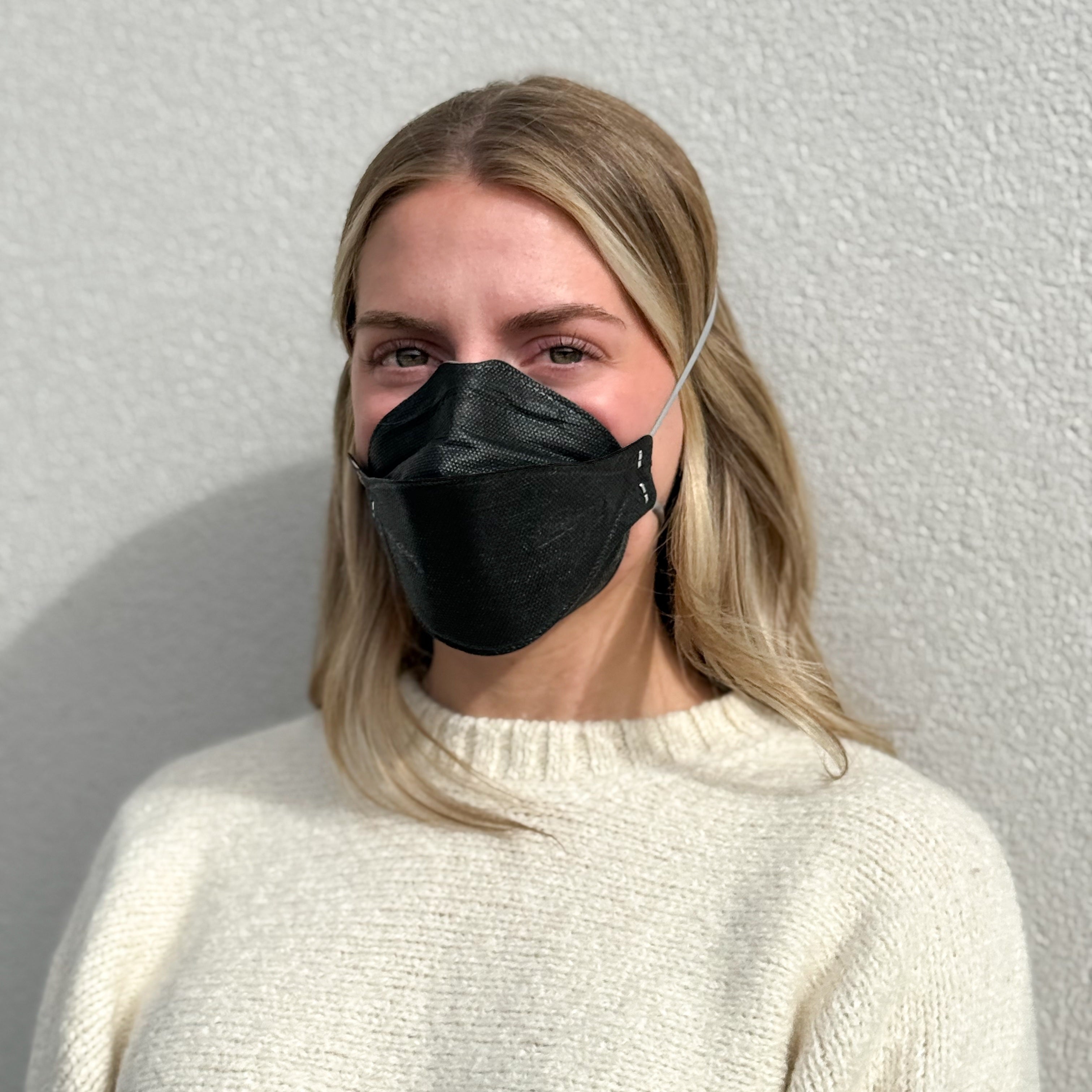 woman with black aura wearing headband mask made by Breatheteq